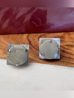 Vintage mid-century Destino cufflinks feature distinctive domed gray stones.